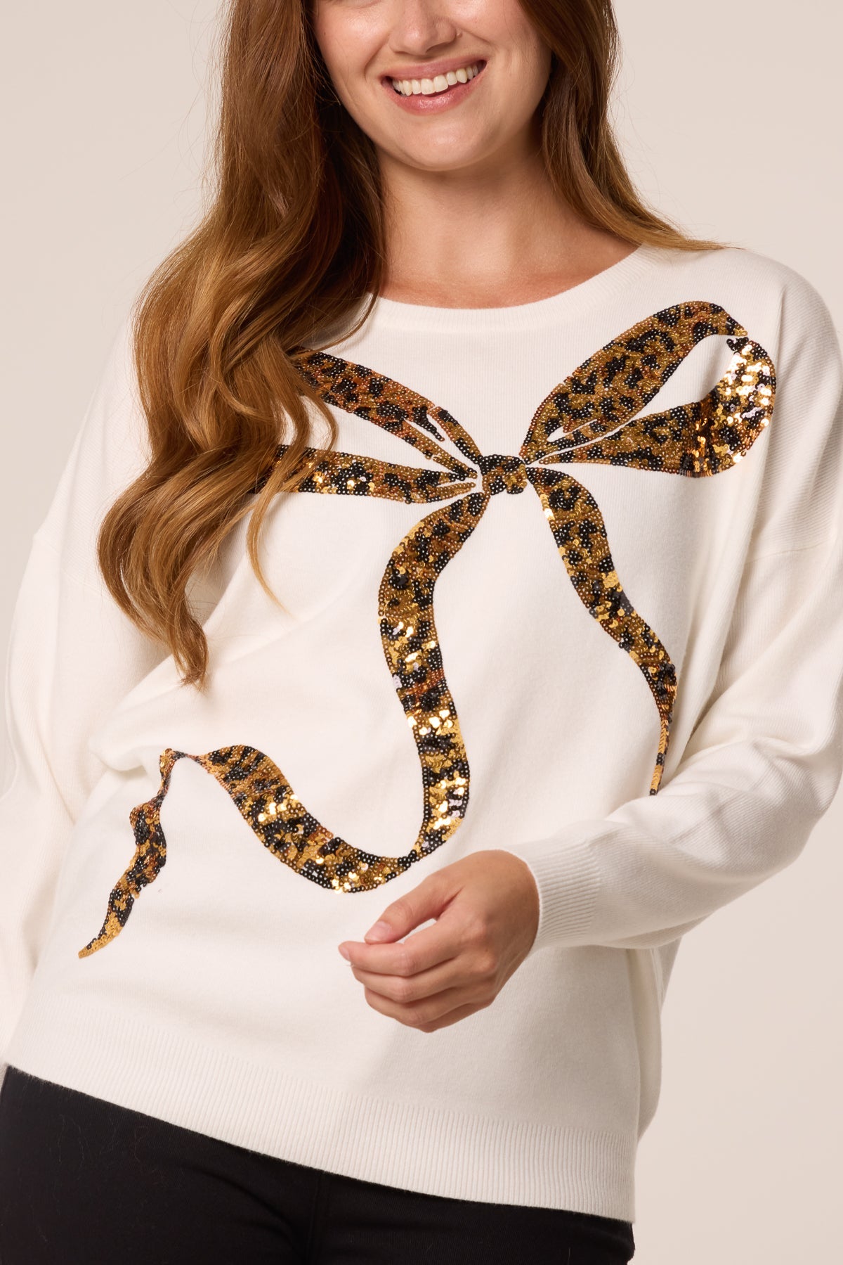 Dame Sweater med Leopardprint og Pailletsløjfe